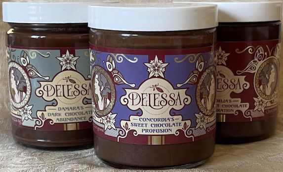 Three Delessa sugar-free chocolate spread jars showing different flavors